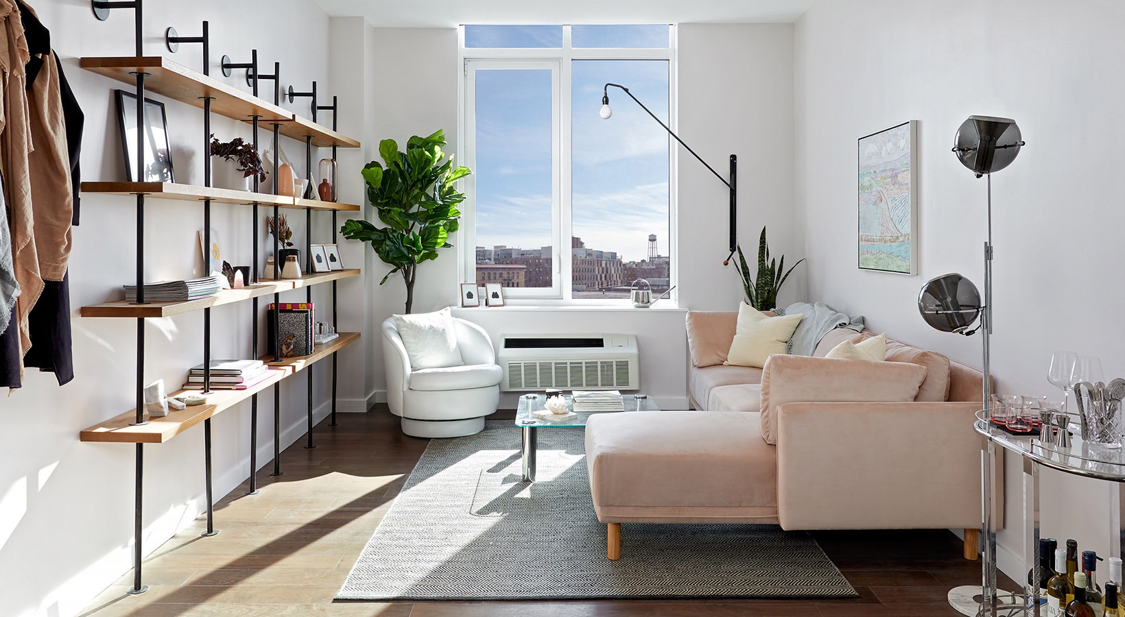 Floorplans well lit living room with large windows